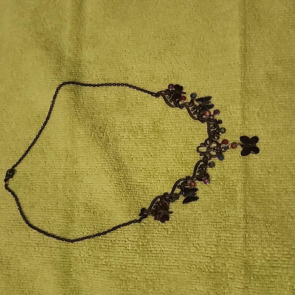 Antique looking butterfly/gemstones looking necklace